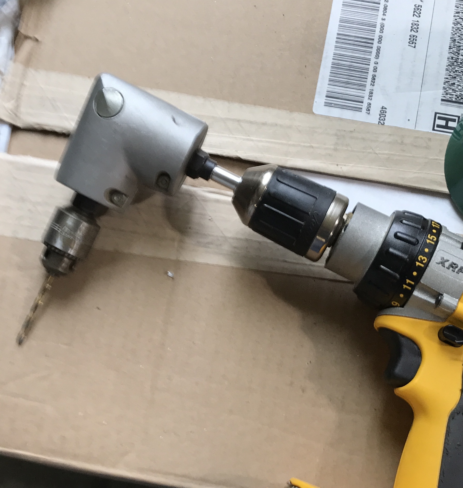 The right angle attachment with adapter fitted to the cordless drill